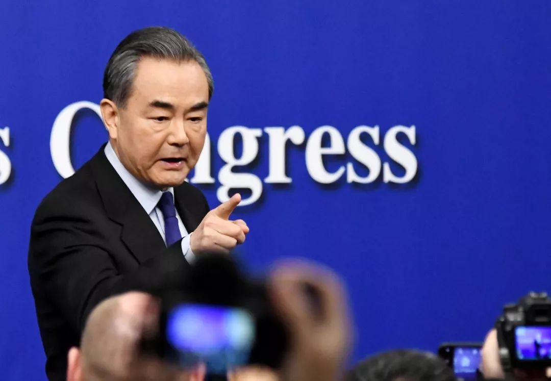 王毅外长与董军防长同框出现，共筑国际安全新篇章